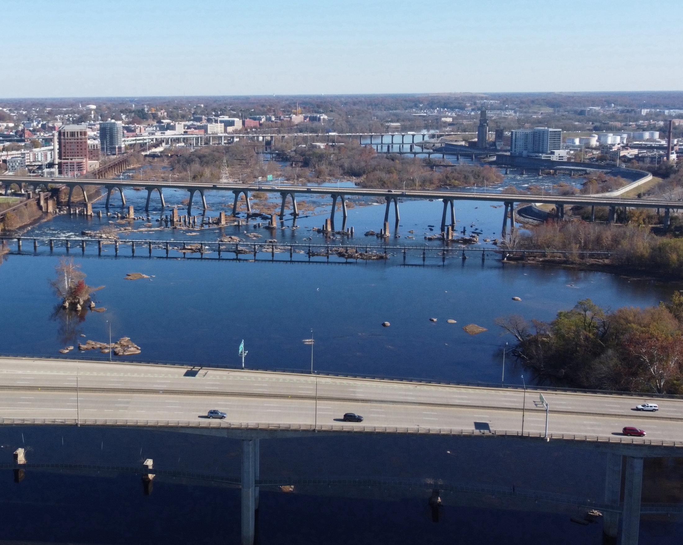 View of a large river in an urban setting. 