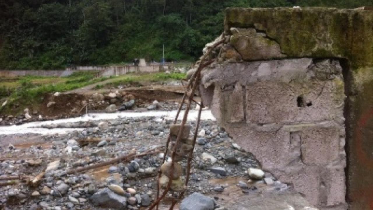 broken wall in front of meadow