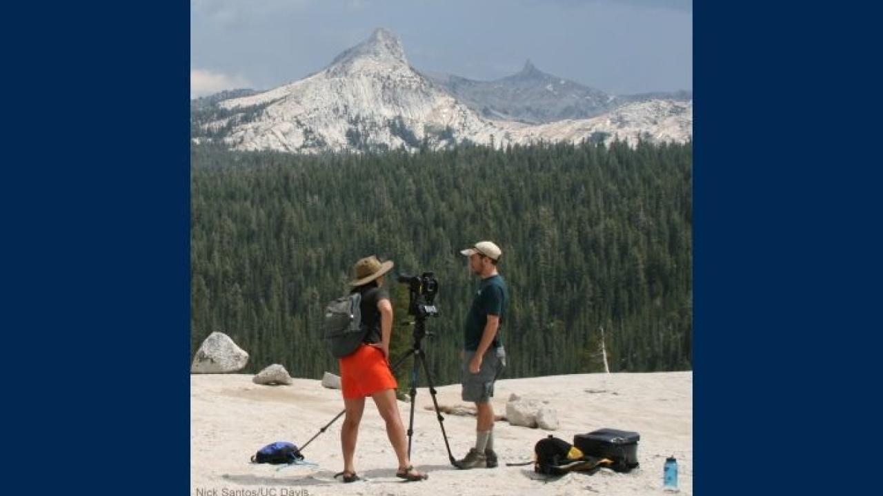 Center researchers Sarah Yarnell and Andy Bell taking ultra-high resolution photos of Tuolumne Meadows panorama. Yosemite's Mount Dana in background, 2013