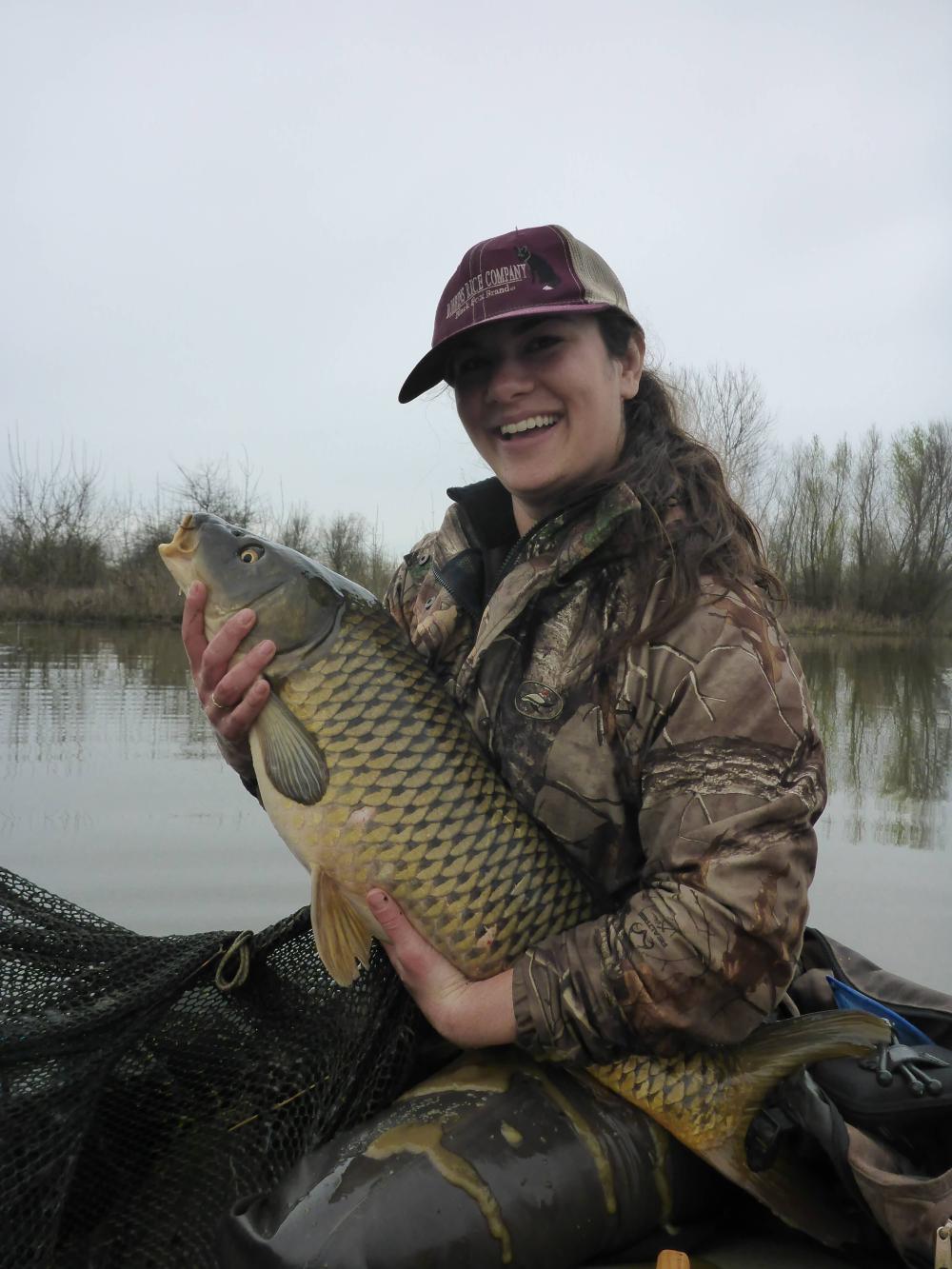 Miranda Bell Tilcock holding carp