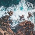 water splashing onto rock