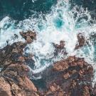 water splashing onto rock